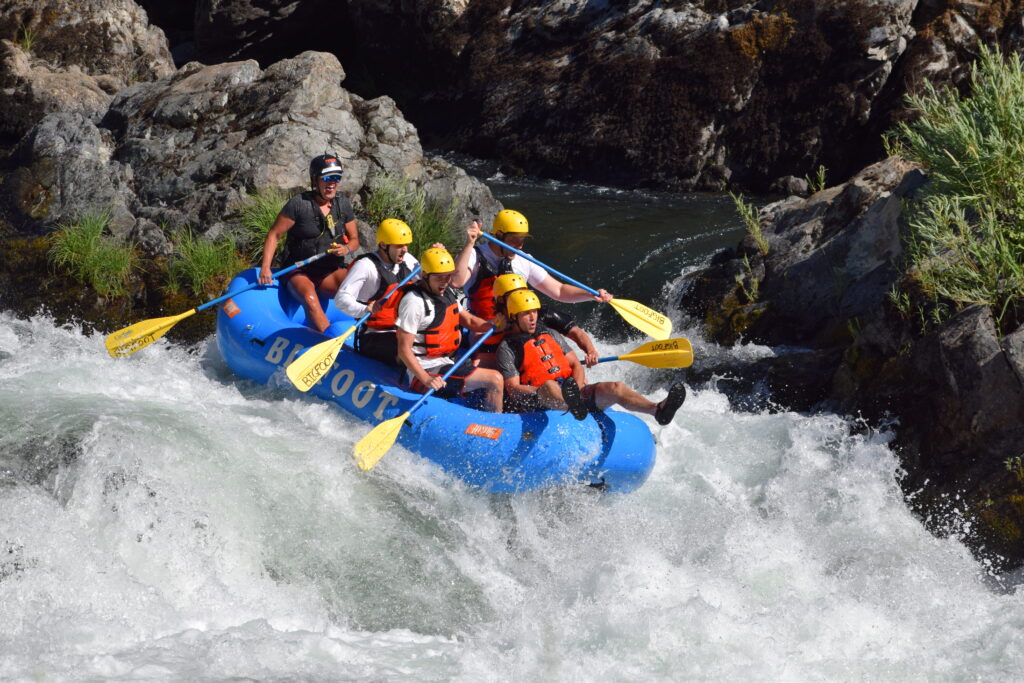 Inflatable raft on whitewater rapids