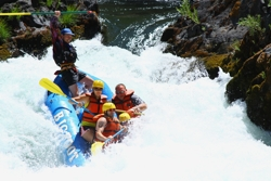 Rafting on intense white water rapids