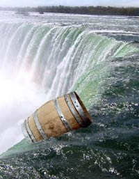 Barrel going down a huge waterfall